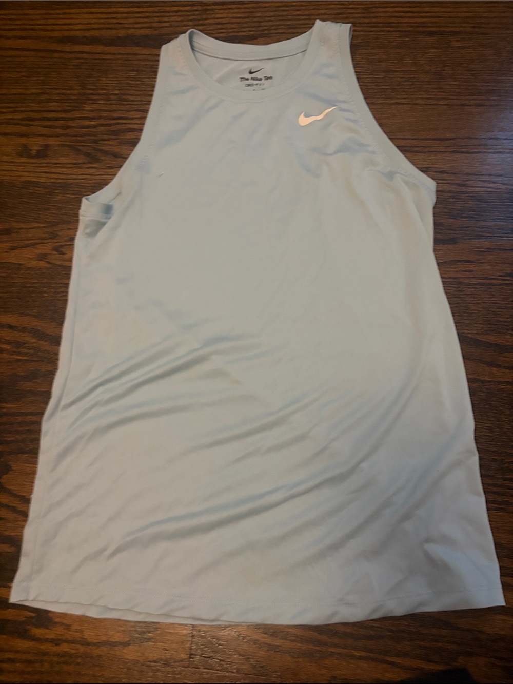 Nike Women’s Pale Blue Athletic Tank with White Swoosh